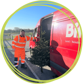 A Biffa team member with a tree